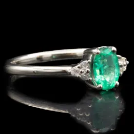 Emerald Engagement Ring With Side Stones